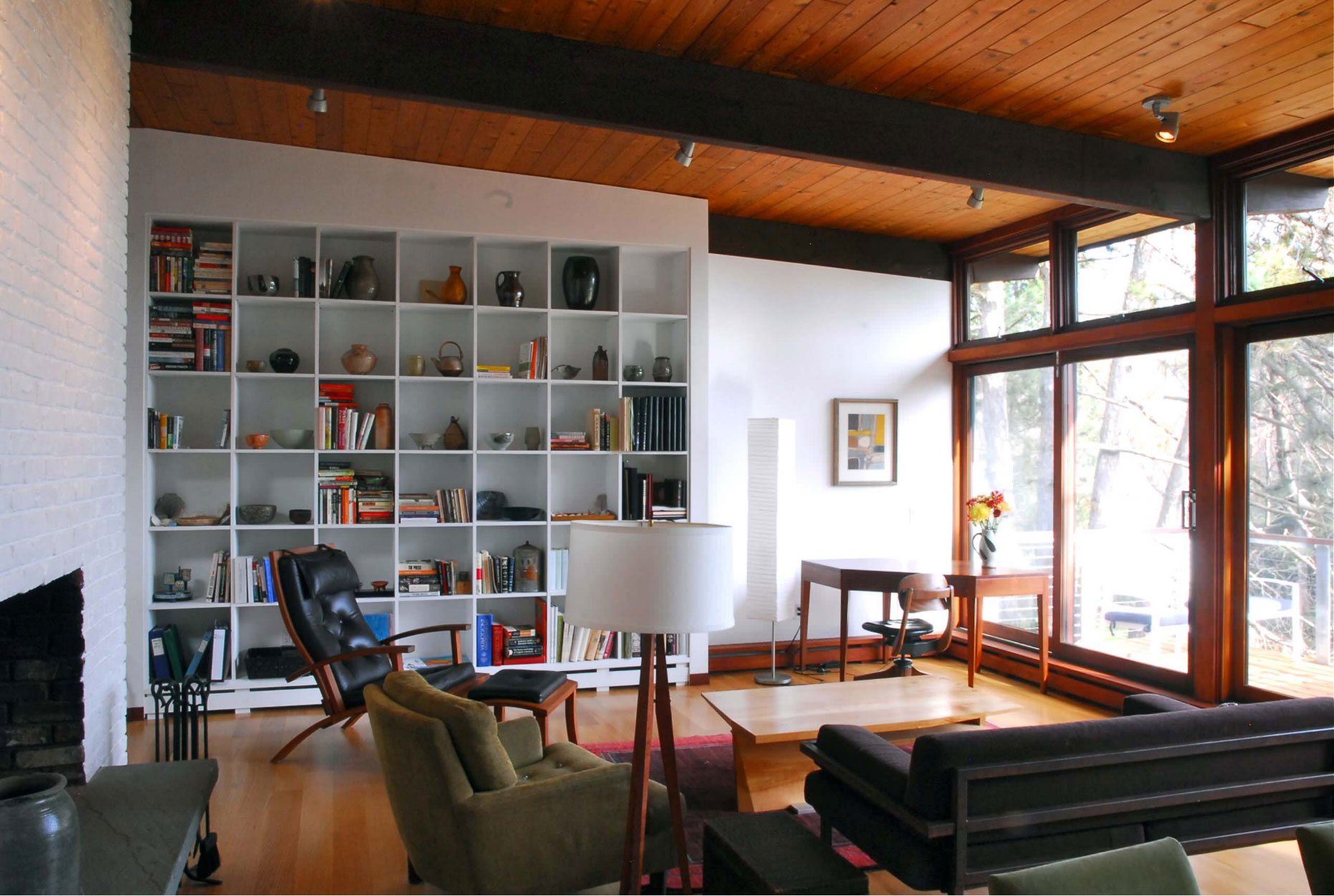 mid-century modern furnished interior built-in bookcase