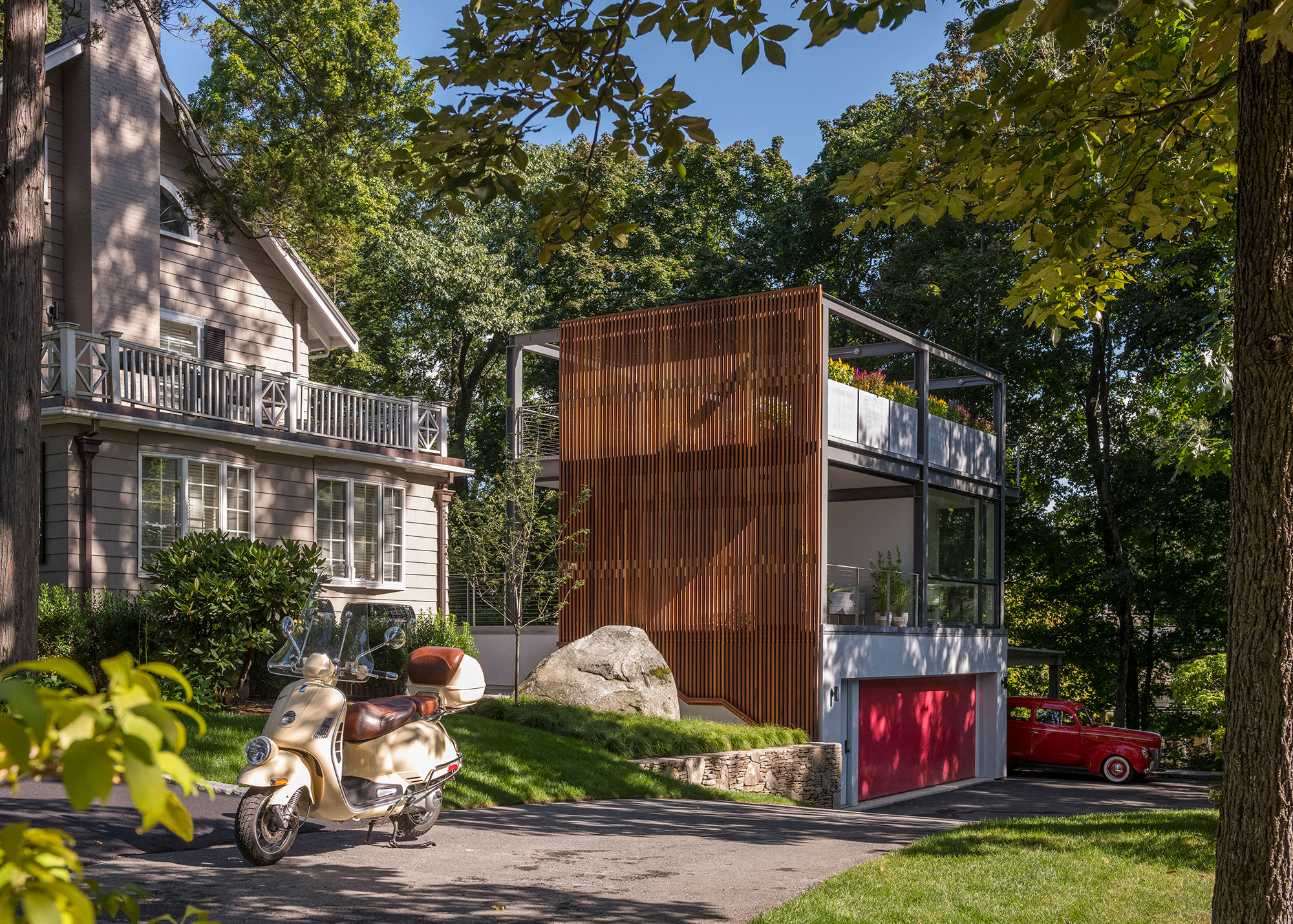 3-story garden folley studio garage accessory building with vintage vespa