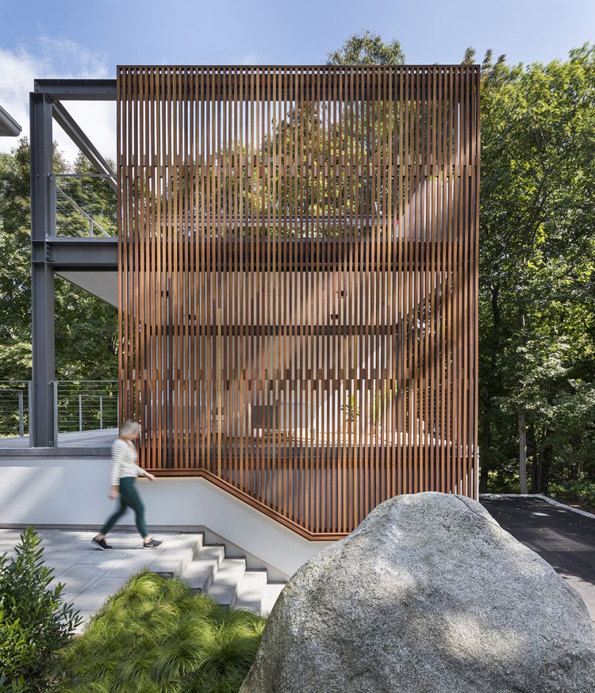 exterior 3-story garage studio steel structure with wood screen