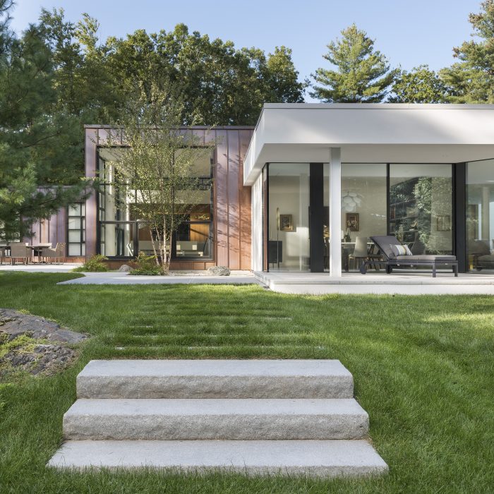 copper cladding with stucco and glass addition