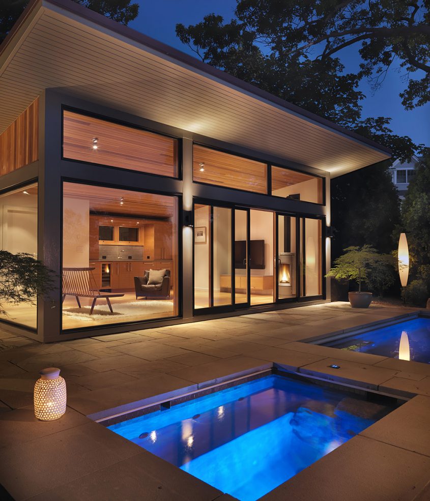 hot tub and cabana lit at dusk