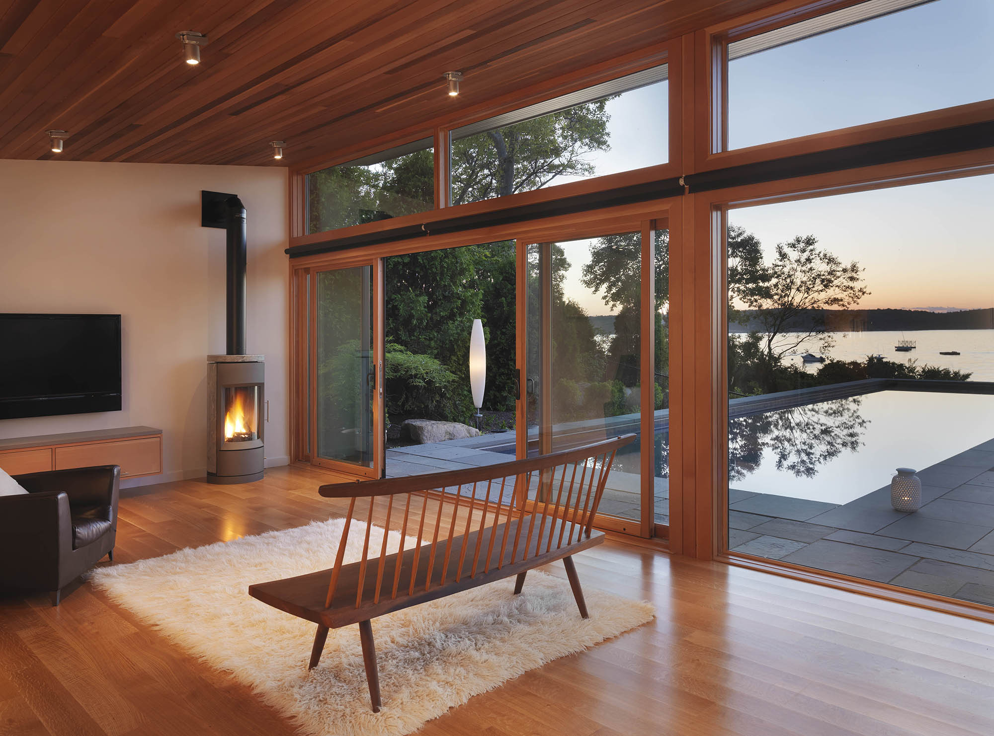 oceanside poolhouse cabana with wood burning stove