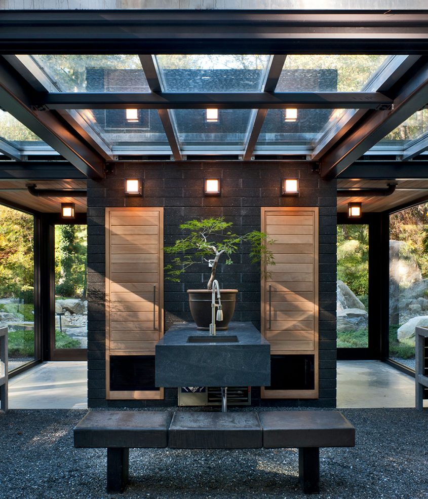 bonsai greenhouse with glass roof and garden sink