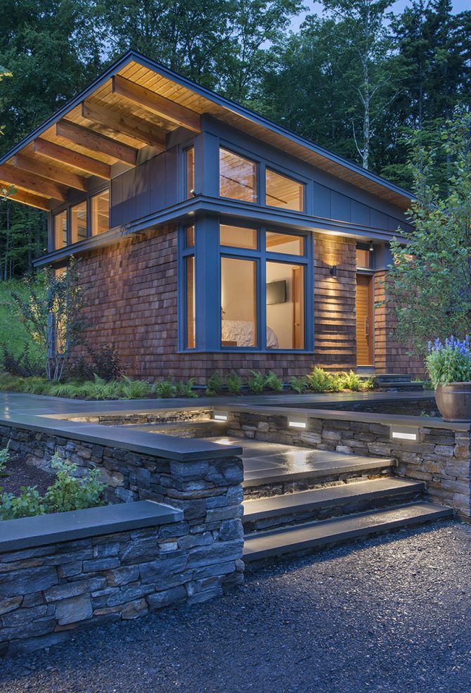 cedar shingle guest house with shed roof