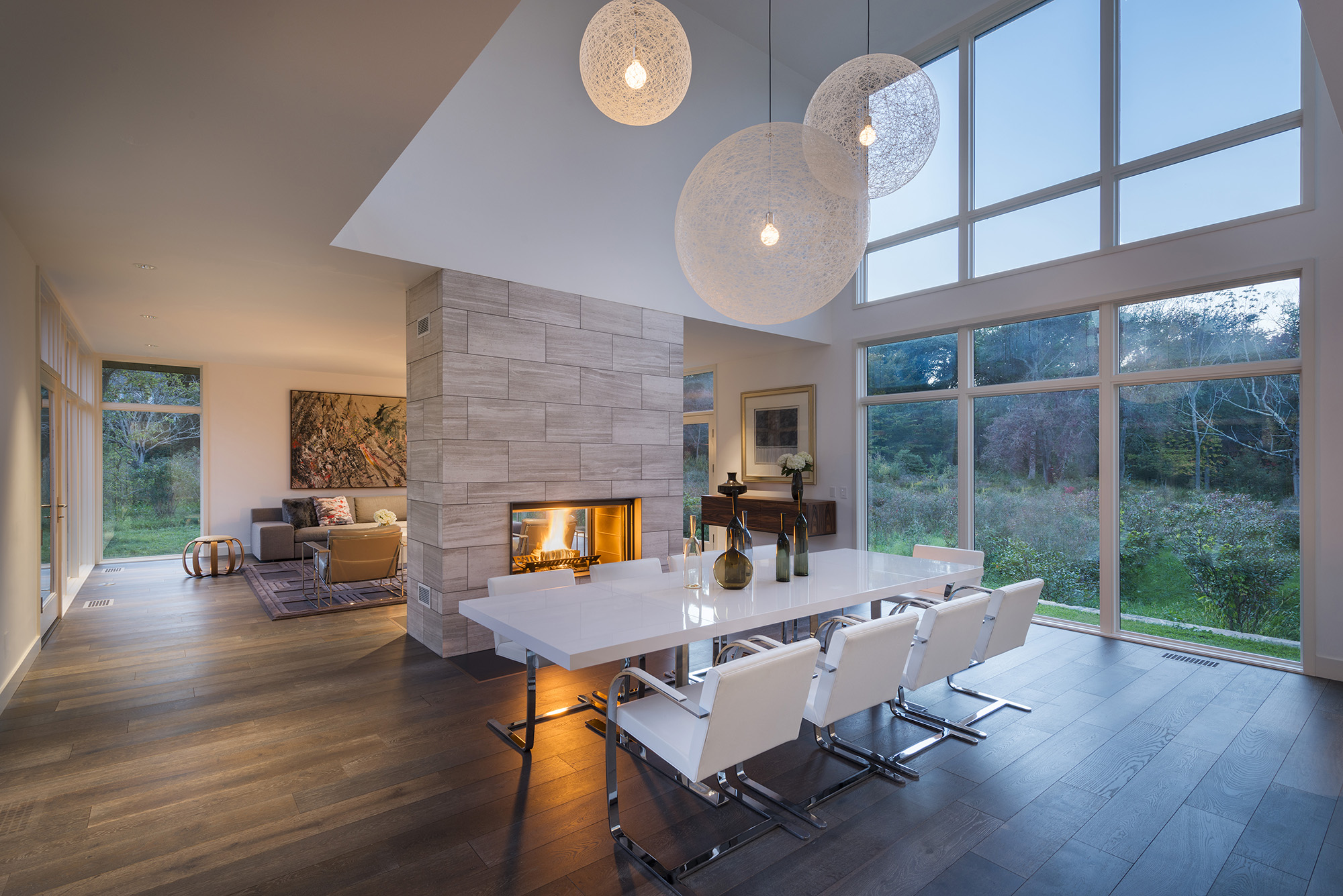 two-sided gas fireplace dining room and living room