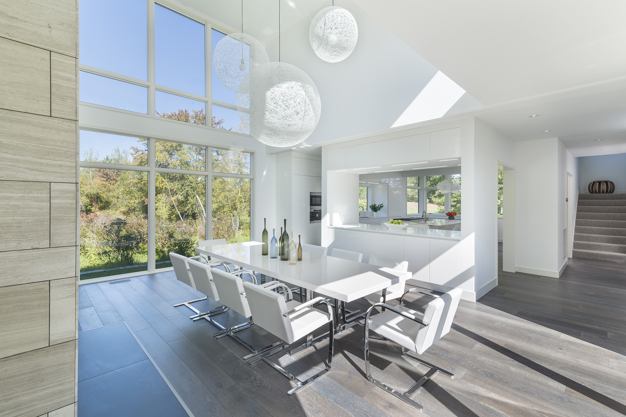 cathedral ceiling dining room with moooi lights