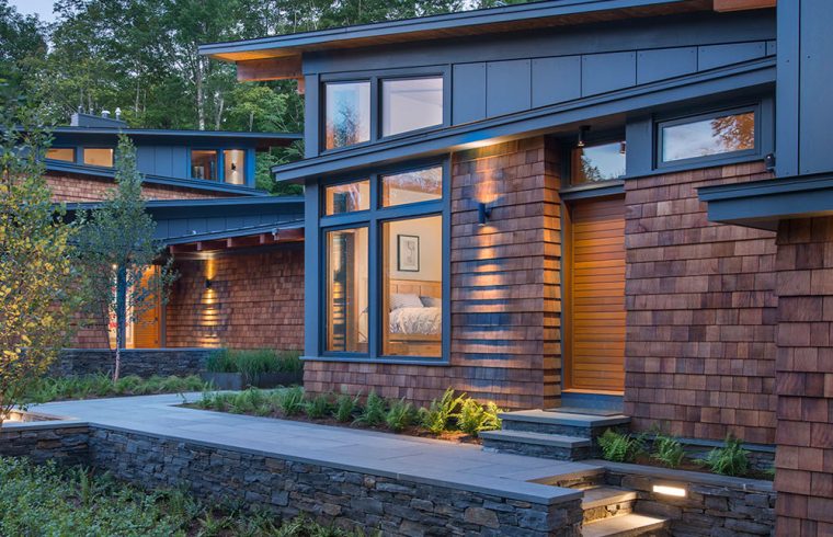 cedar shingle entry lit at dusk