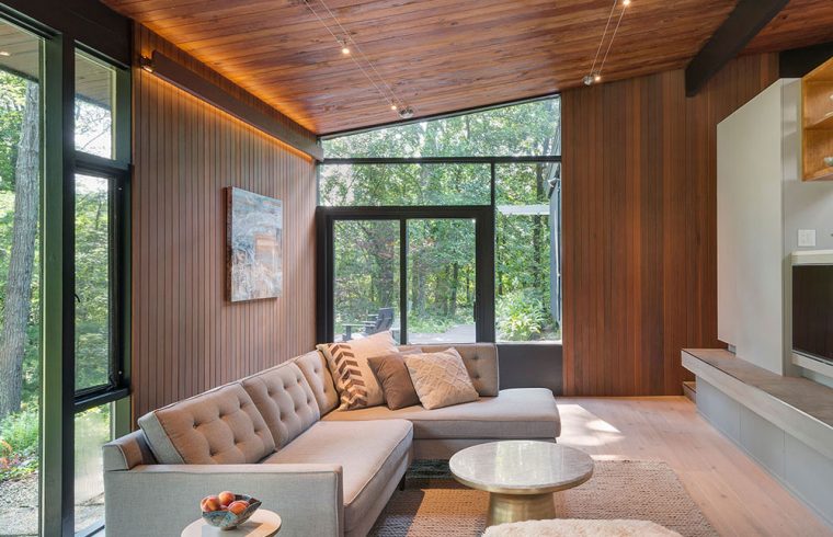 mid-century modern furnished family room with wood ceiling