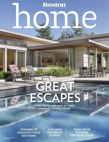 boston home magazine cover of swimming pool and rear exterior of modern home
