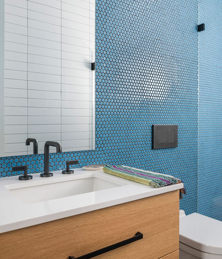 bathroom with baby blue penny round and subway tile