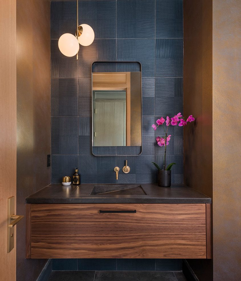 modern powder room with floating vanity