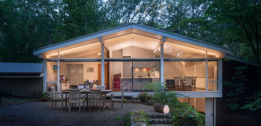mid-century modern exterior with glass walls