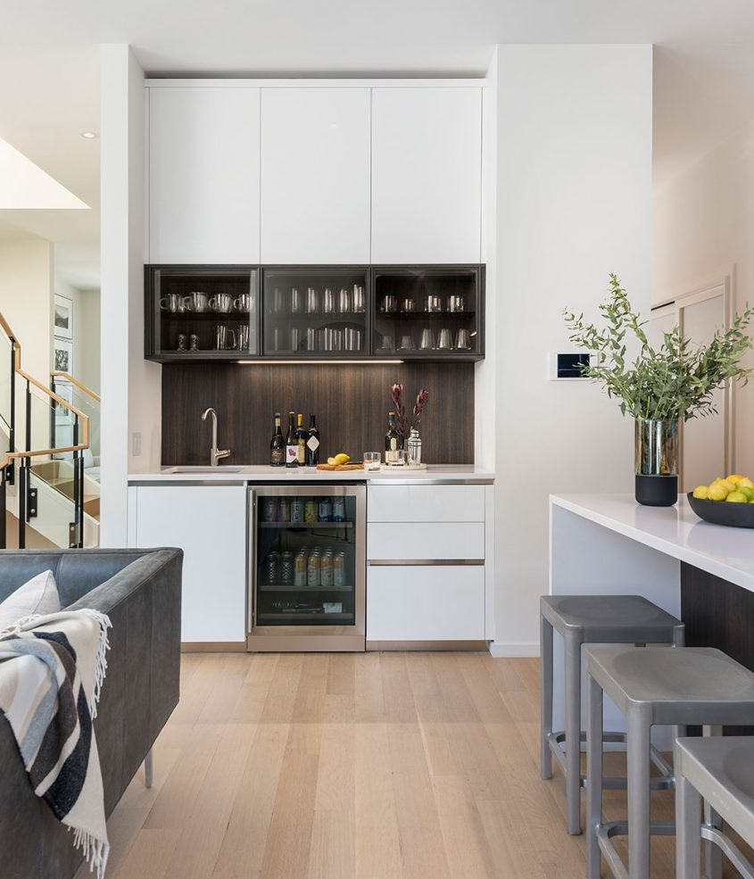 modern wet bar adjacent to kitchen