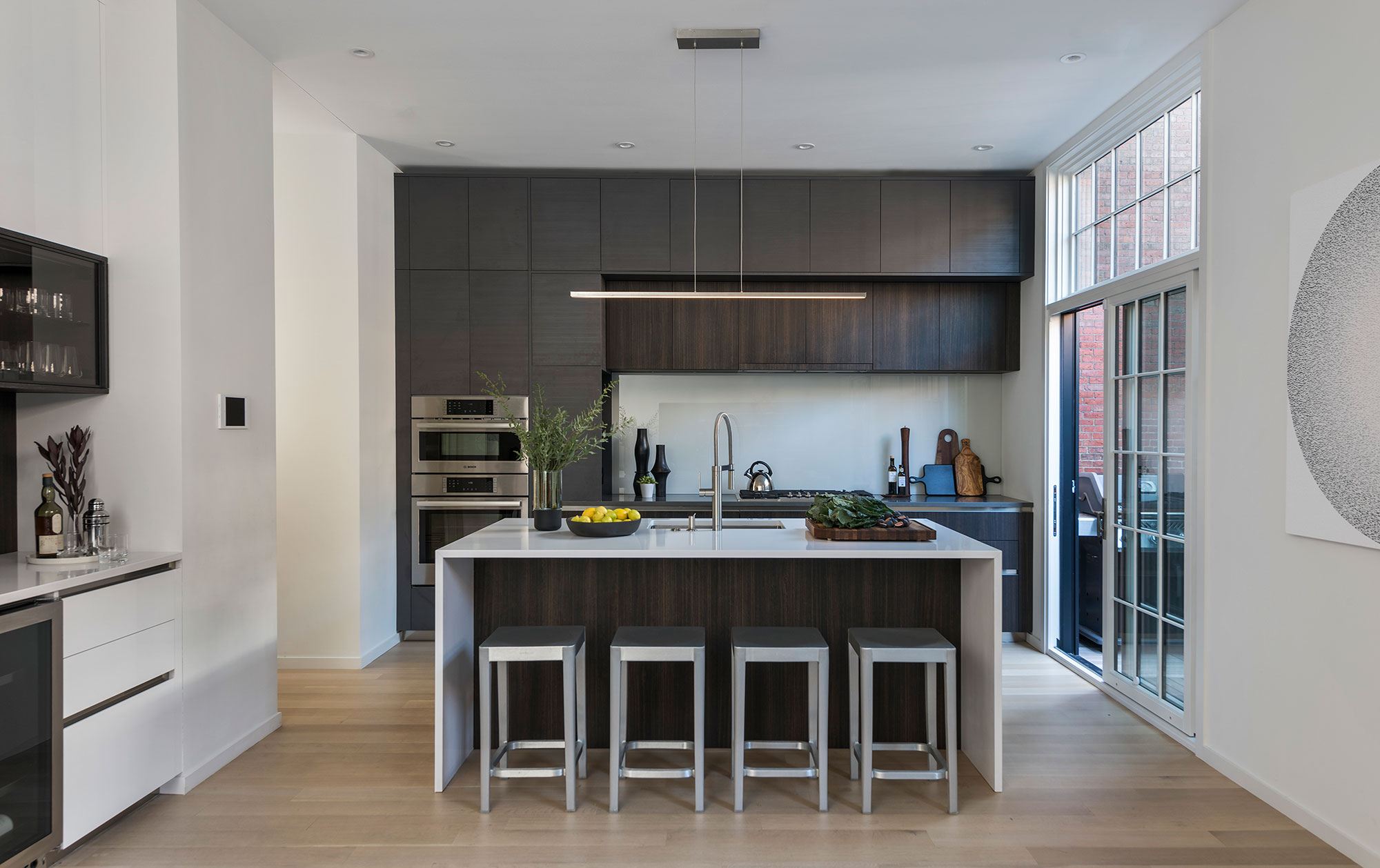 kitchen with sink island and outdoor balcony