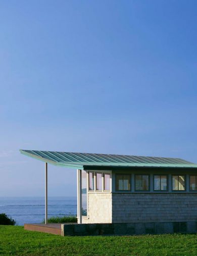 exterior addition with metal cantilevered roof