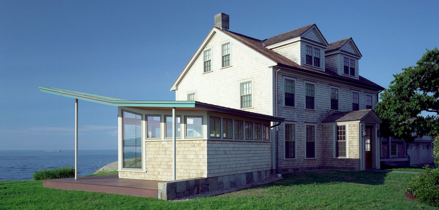 exterior of ocean front new england home