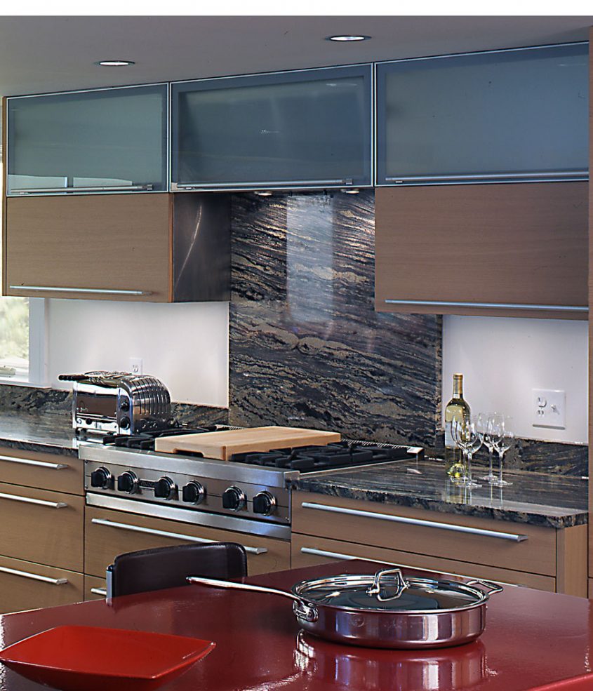 interior view of kitchen cooktop and cabinets