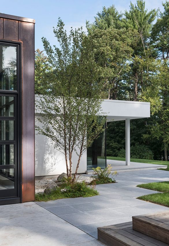 copper clad home with stucco and glass addition