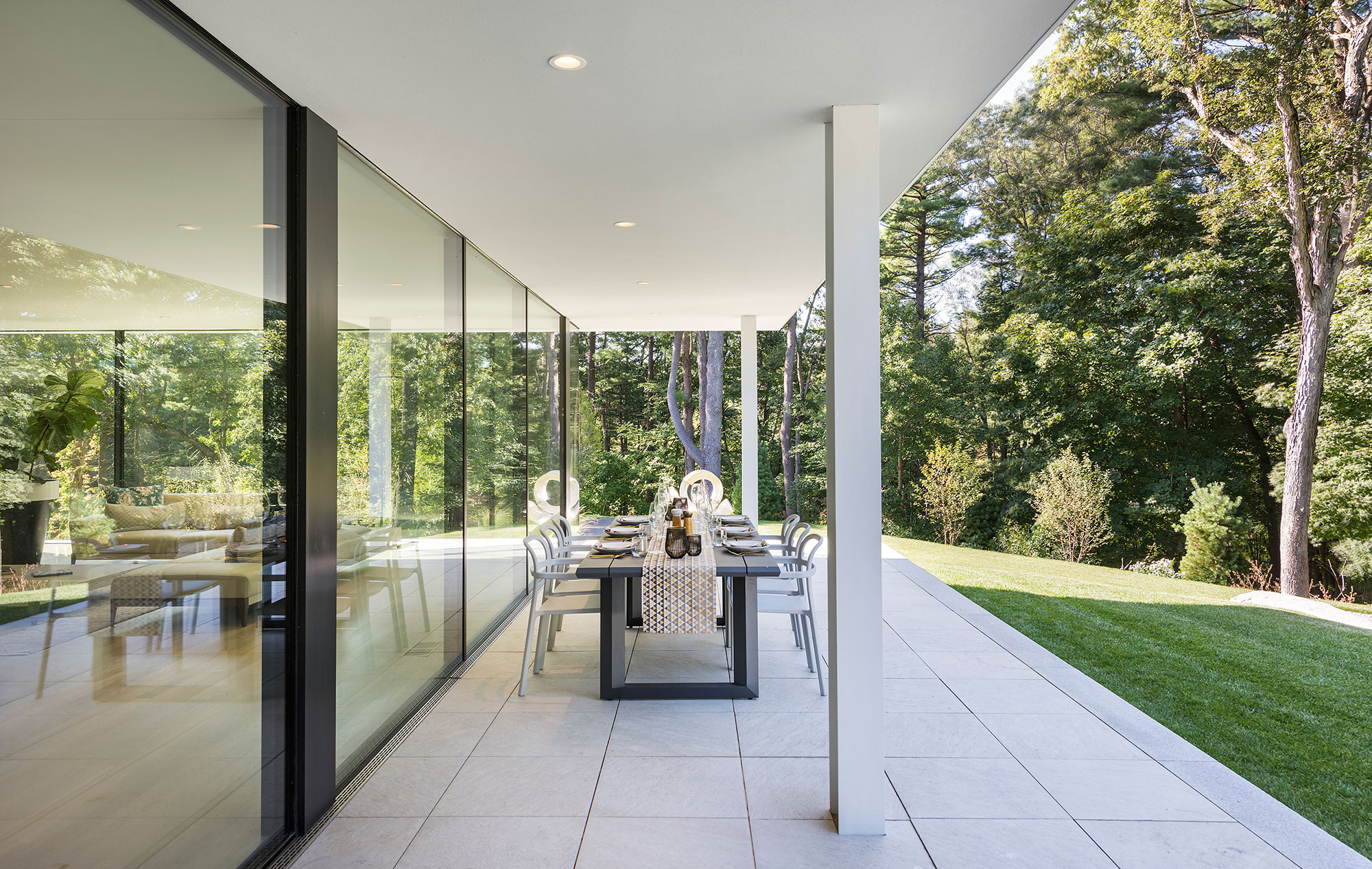 outdoor dining terrace with cantilevered roof