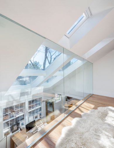 interior glass wall balcony with skylights