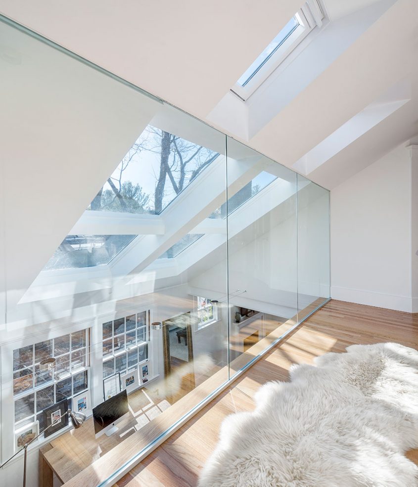 interior glass wall balcony with skylights