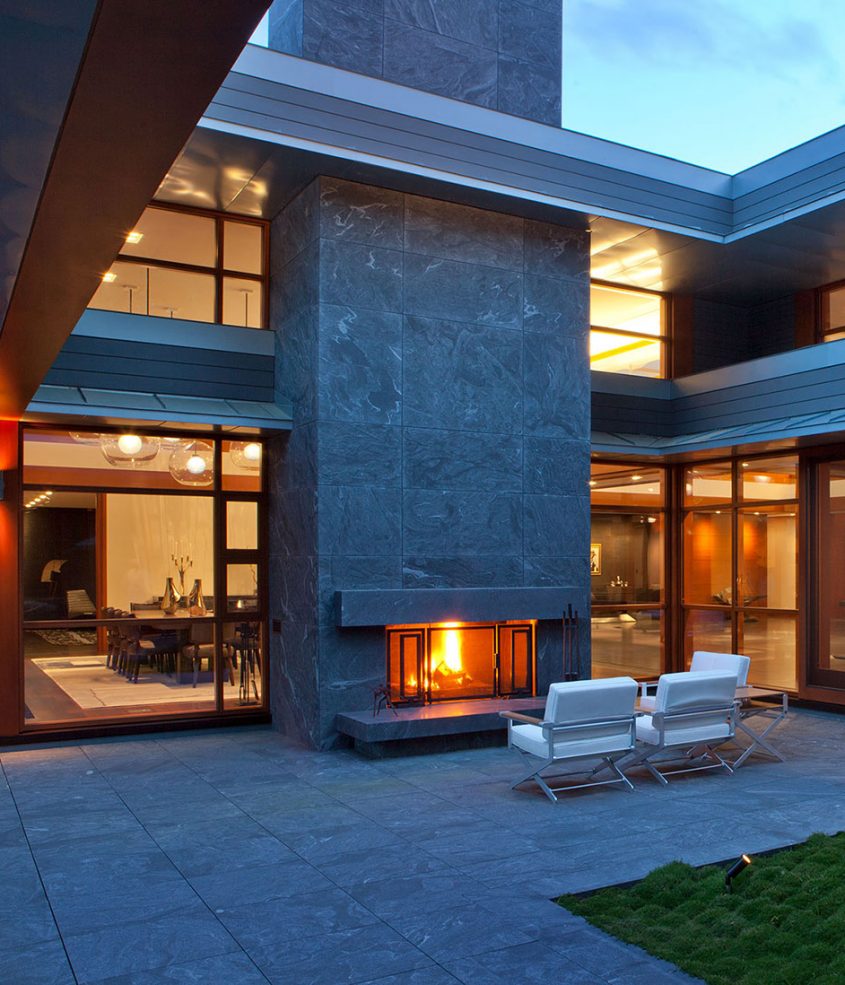 large exterior fireplace on terrace