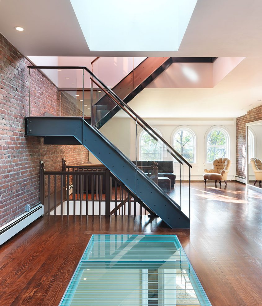 interior with steel staircase and glass floor window