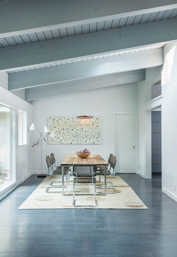 mid-century modern dining room with exposed beams