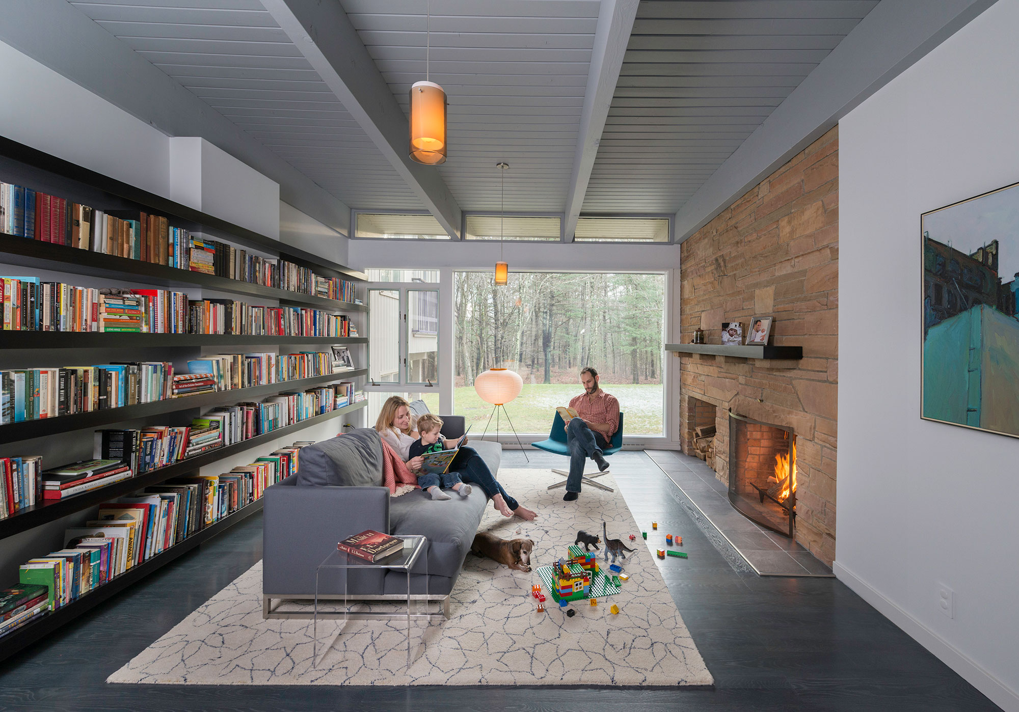 mid-century modern family room with fireplace
