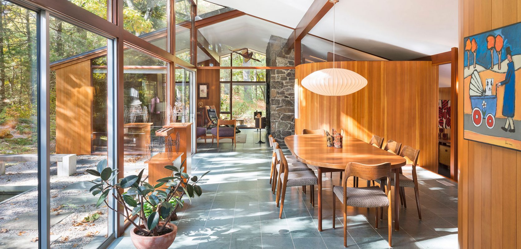 mid-century modern dining room floor to ceiling windows