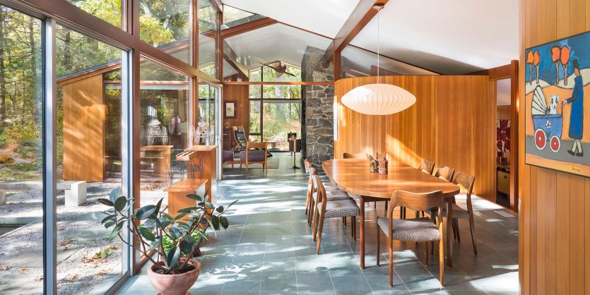 mid-century modern dining room floor to ceiling windows