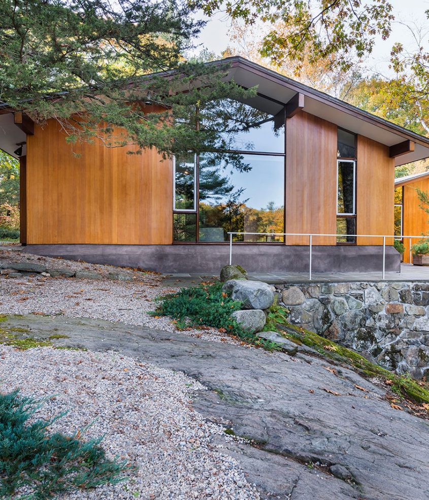mid-century modern wood exterior floor to ceiling glass window
