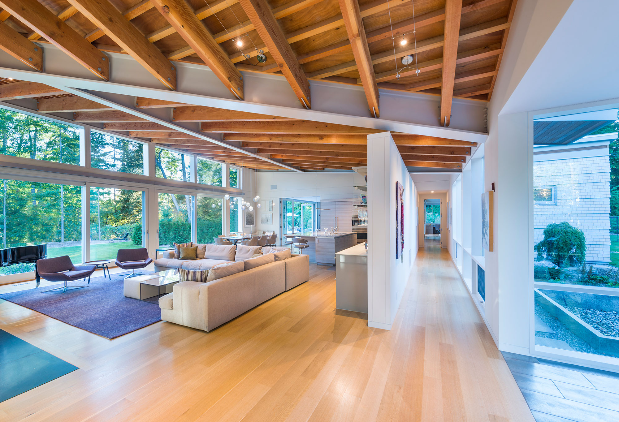 open layout great room kitchen living dining with exposed timber ceiling
