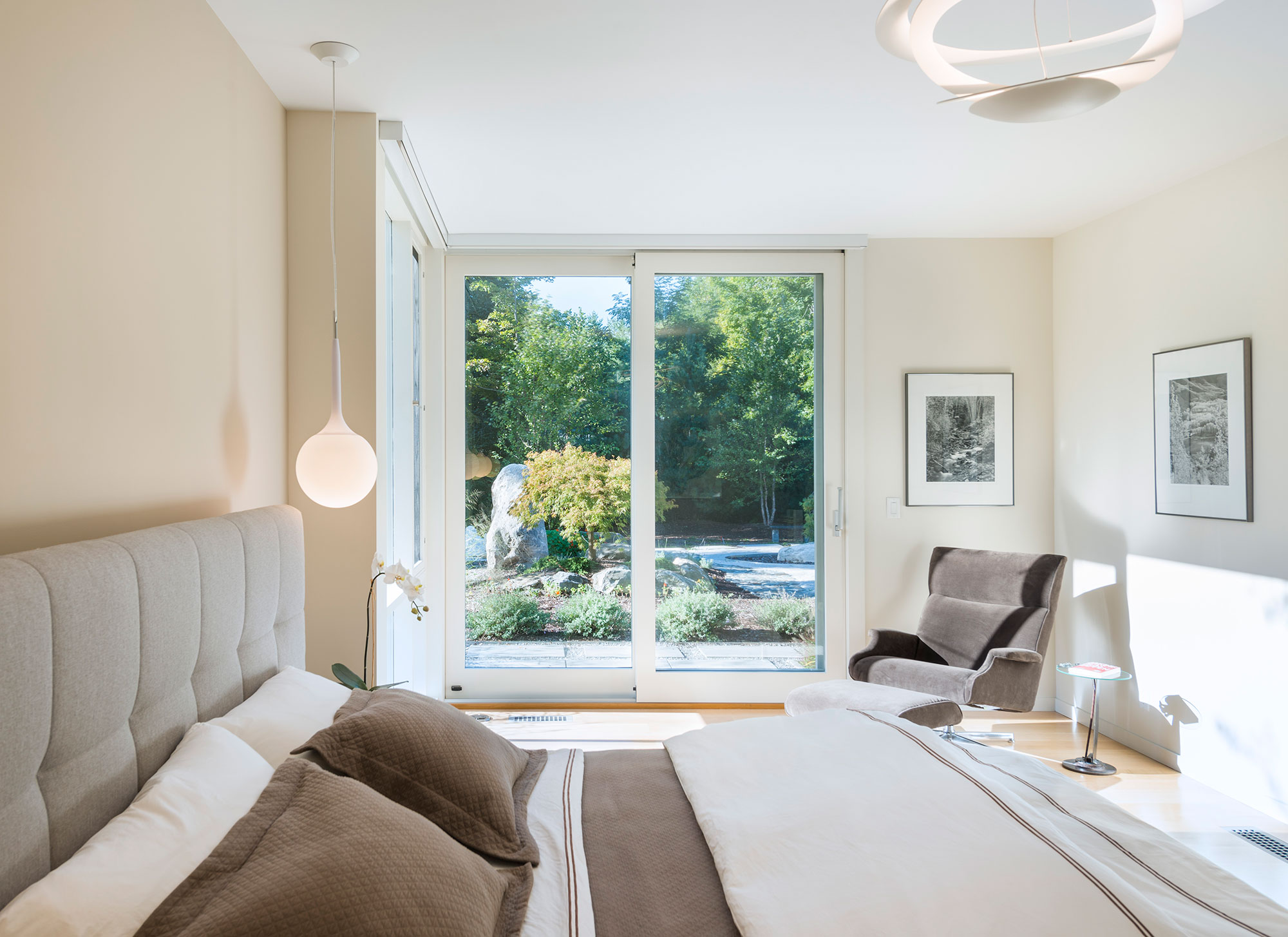 furnished master bedroom with exterior sliding door