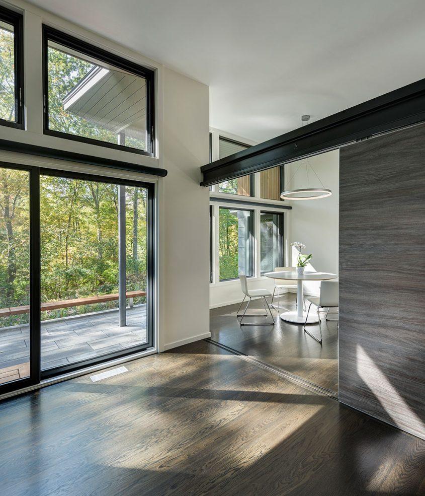 eat-in kitchen detail with exposed steel beam and sliding wall