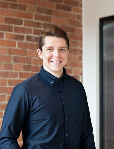 headshot portrait of adam schroth