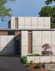 driveway entry of concrete home