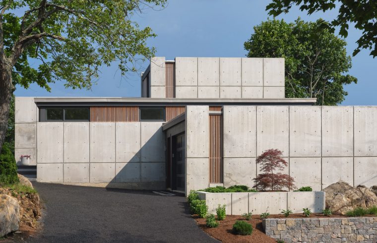 driveway entry of concrete home