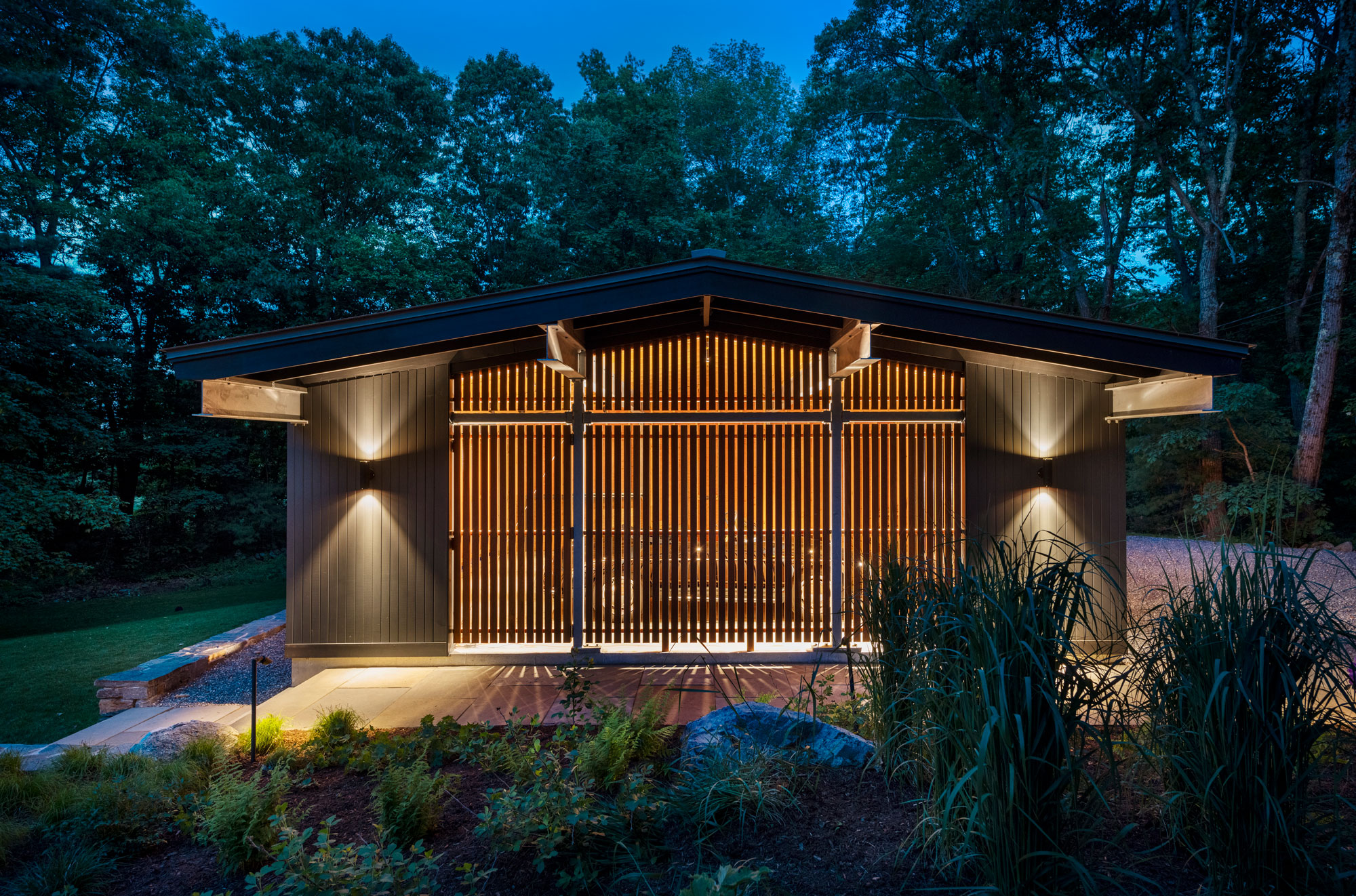 carport glowing at dusk