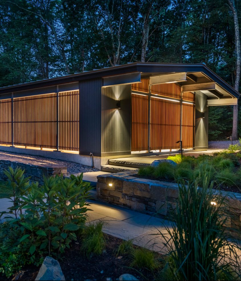 carport glowing at dusk