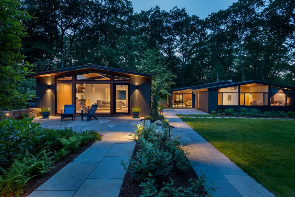studio and house glowing at dusk
