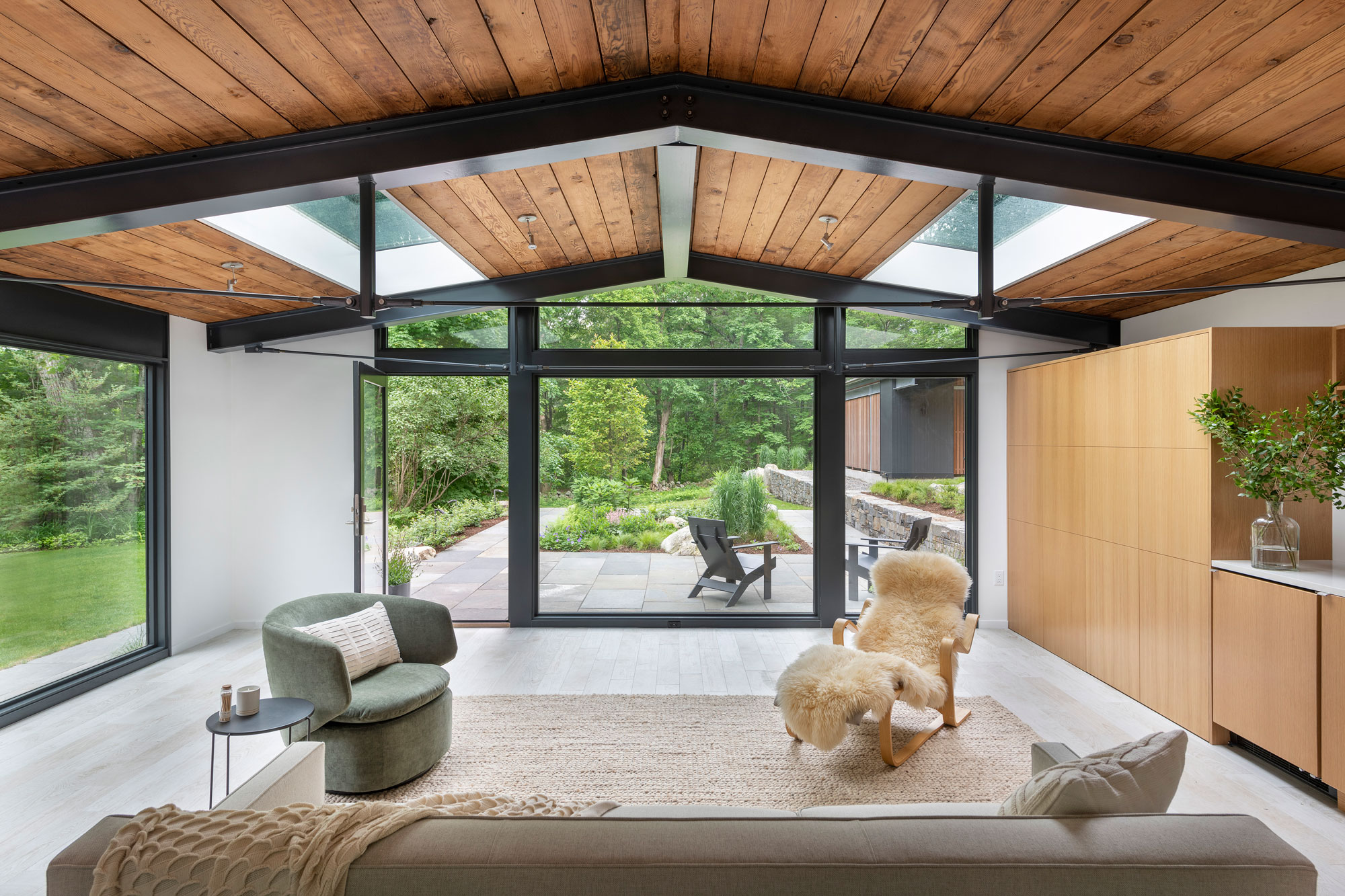 interior of studio looking out to terraced patio