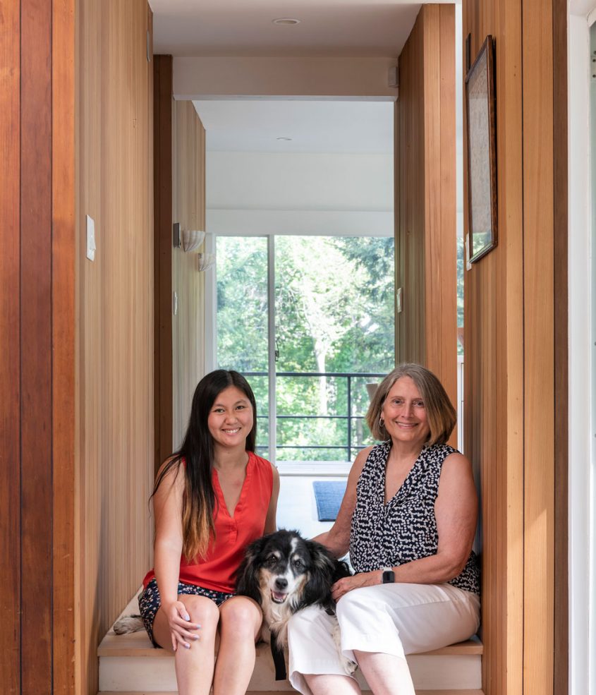 family on stairs in hallway