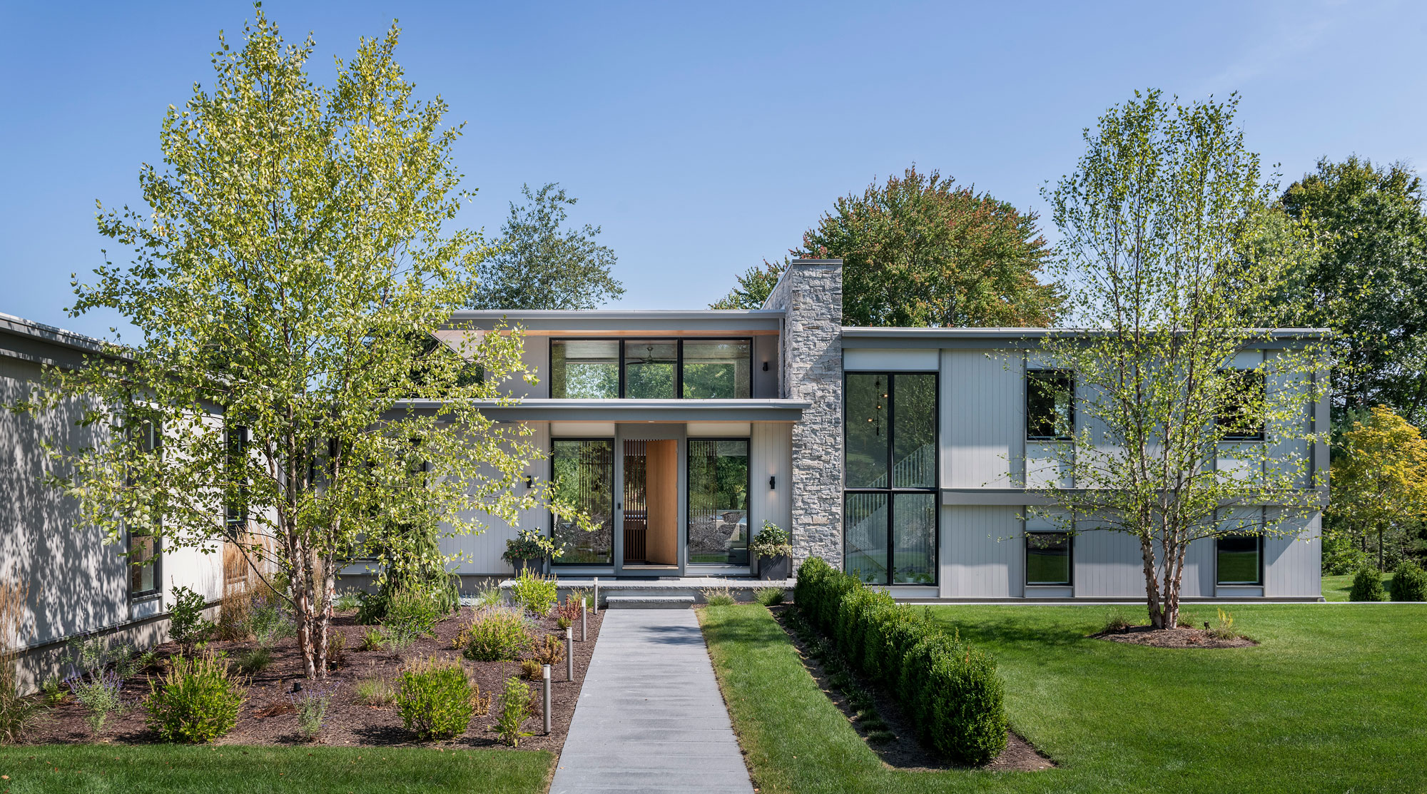 front elevation of modern split-level home