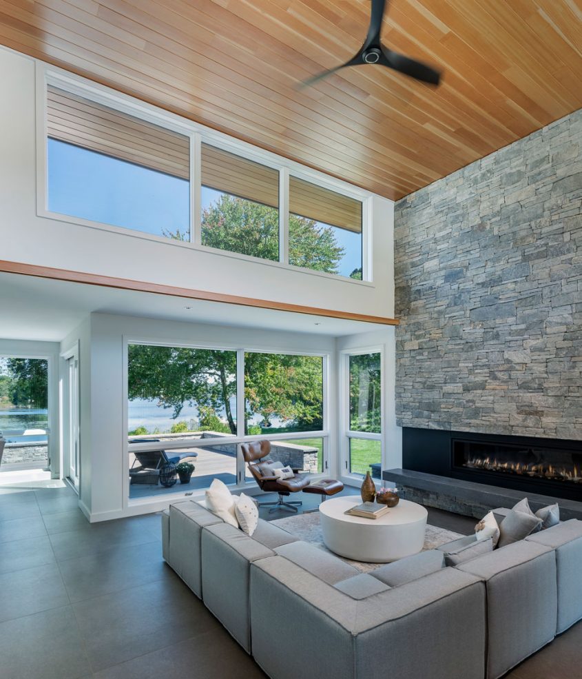 living room looking out over waterfront deck