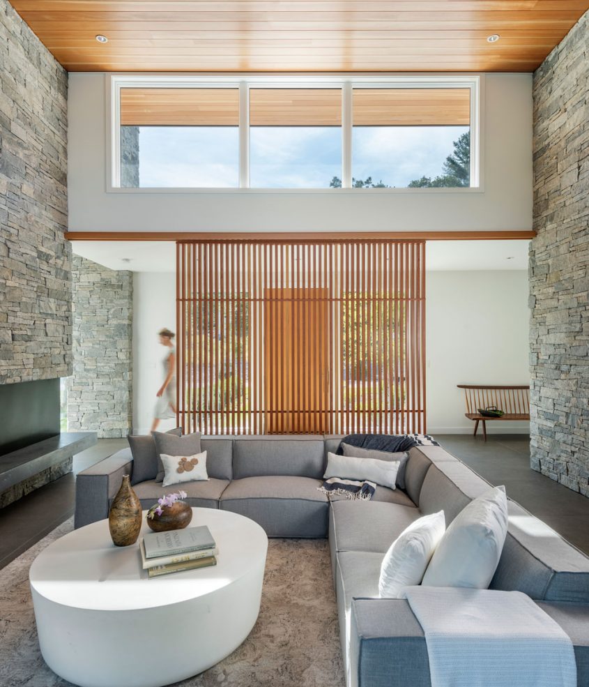 living room toward front entry behind screen