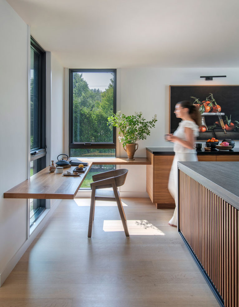 Open desk space with natural lighting and natural modern aesthetic.